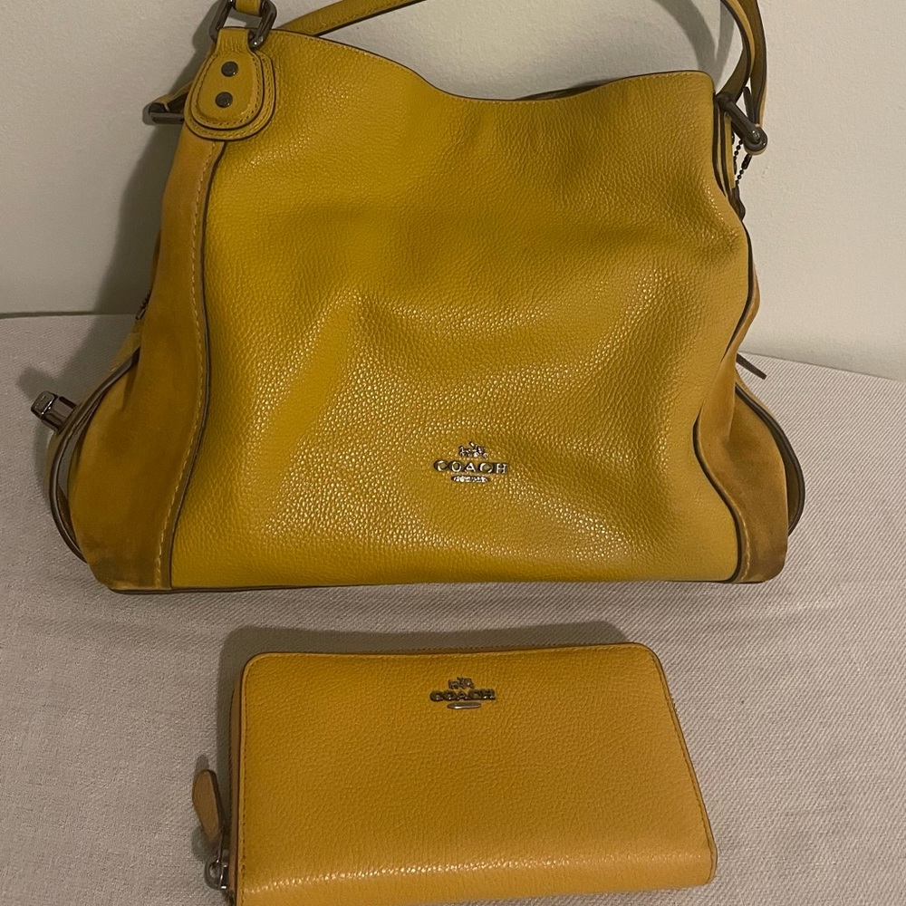 Coach incredibly soft leather handbag with matching wallet.